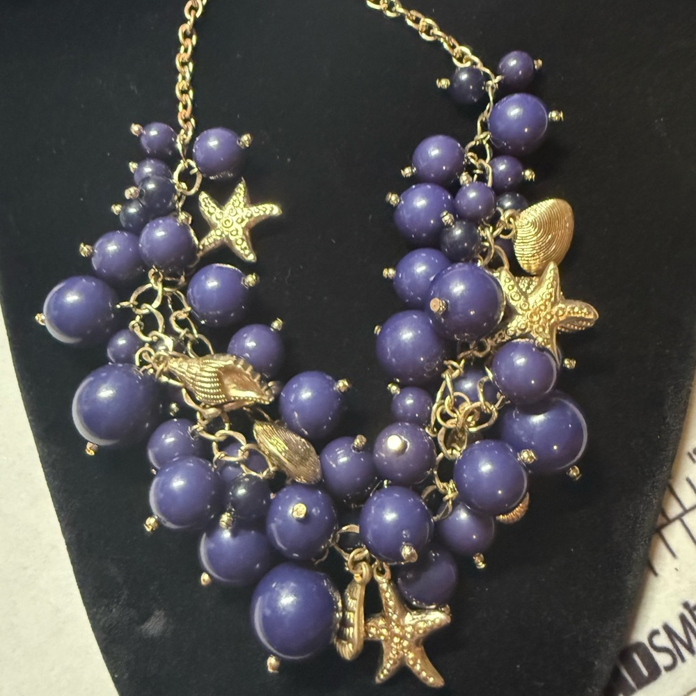 Gold Sea Charm Statement Necklace with Navy Blue Beaded Clusters